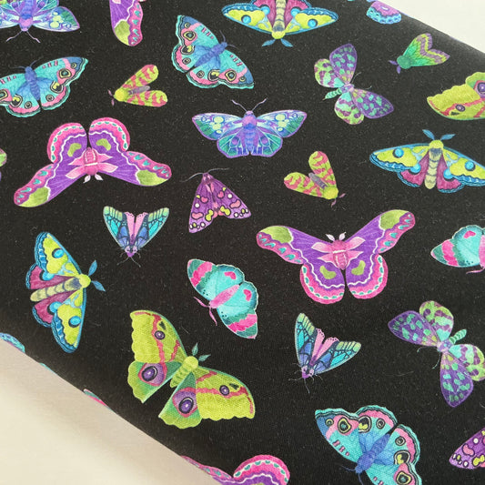 Multicoloured Moths Scattered on Black - Nightshade