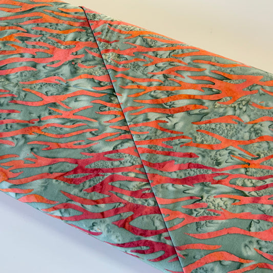 Batik Orange Streaks on Green